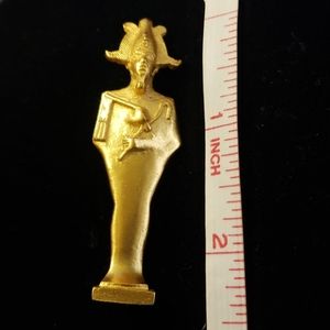 Vintage, gold tone Egyptian statue brooch